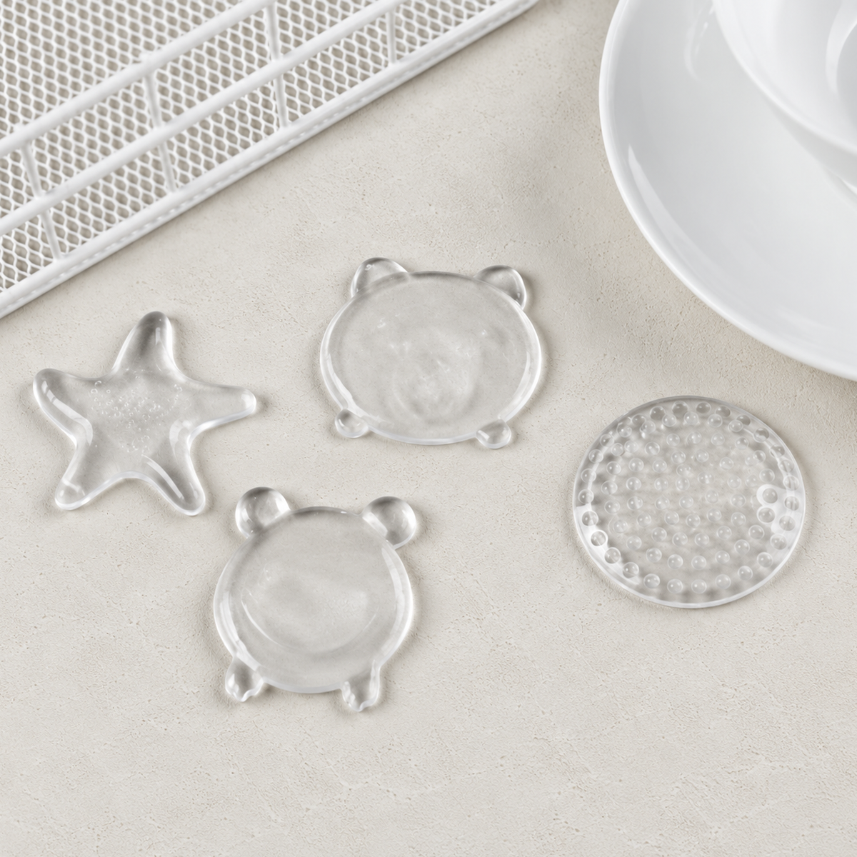 Kindwall clear silicone bumpers in sea star, bear, frog and round shapes, soft and self-adhesive
